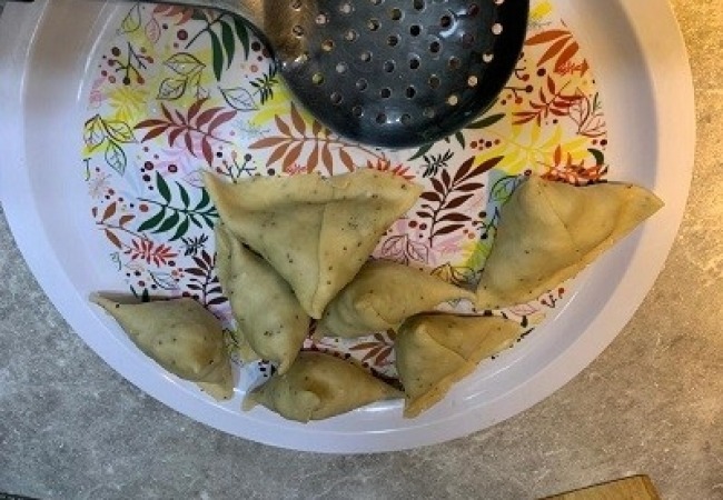 Take them out of the oil when the samosas turn golden brown