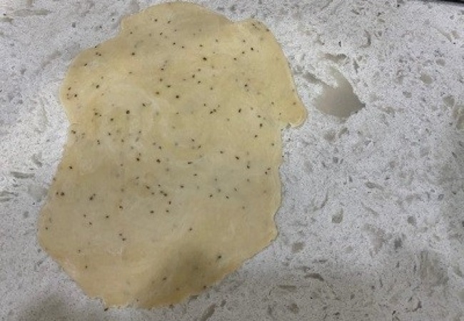 Make triangle shapes with flattened doe and fill the pockets up with samosa filling