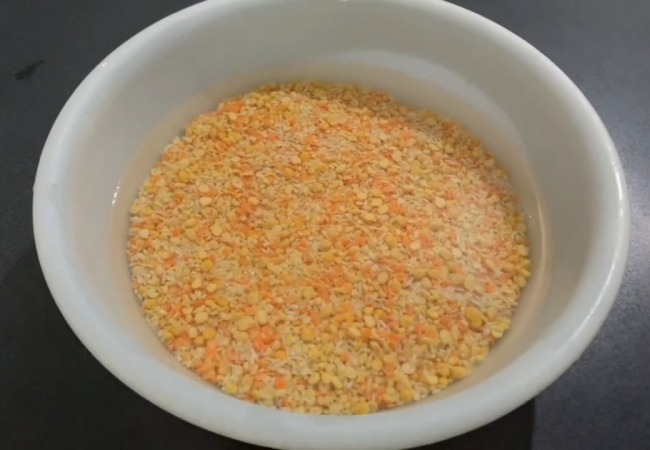 First step of the recipe is to soak mixed lentils in water overnight