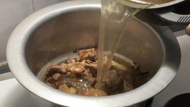 Preparing broth for mutton Pulao Recipe